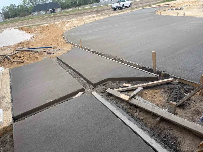 Freshly poured concrete driveway and walkway from the existing Magnolia project gallery